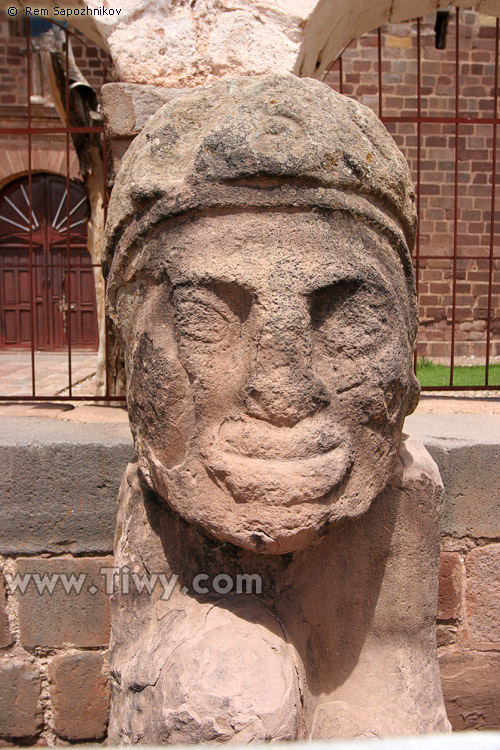 Stone head at the entrance to the Tiwanaku church