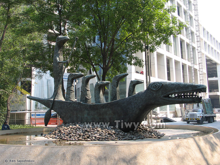 �Crocodile family on a river stroll�
