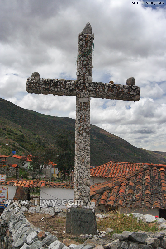 Stone cross near stone Church of Juan Felix Sanchez at San Rafael