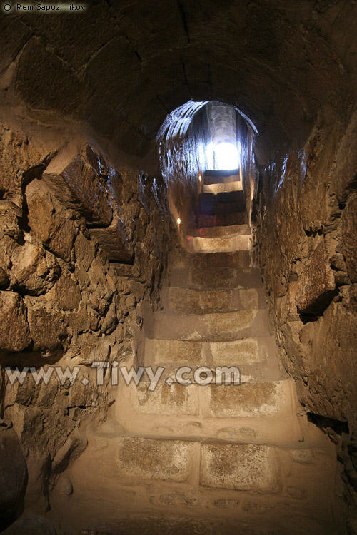 This narrow stone staircase leads to the roof of the church