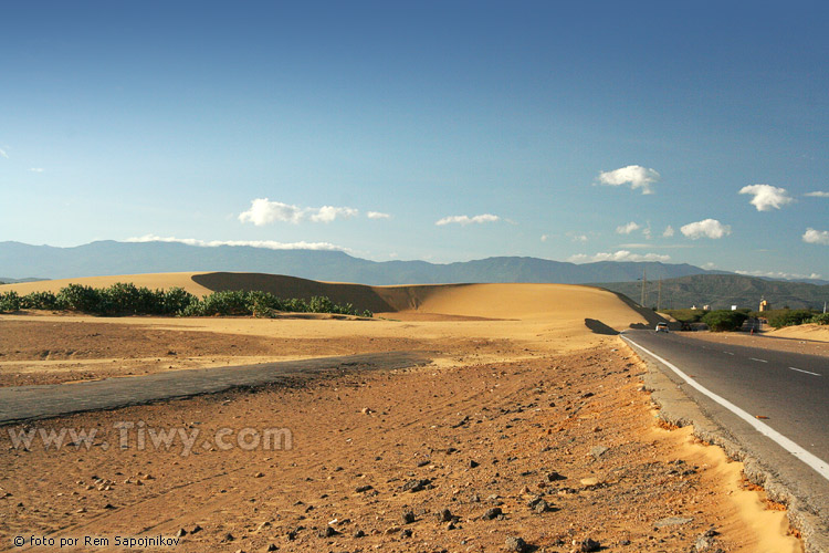 Among the sands one can see parts of old highway